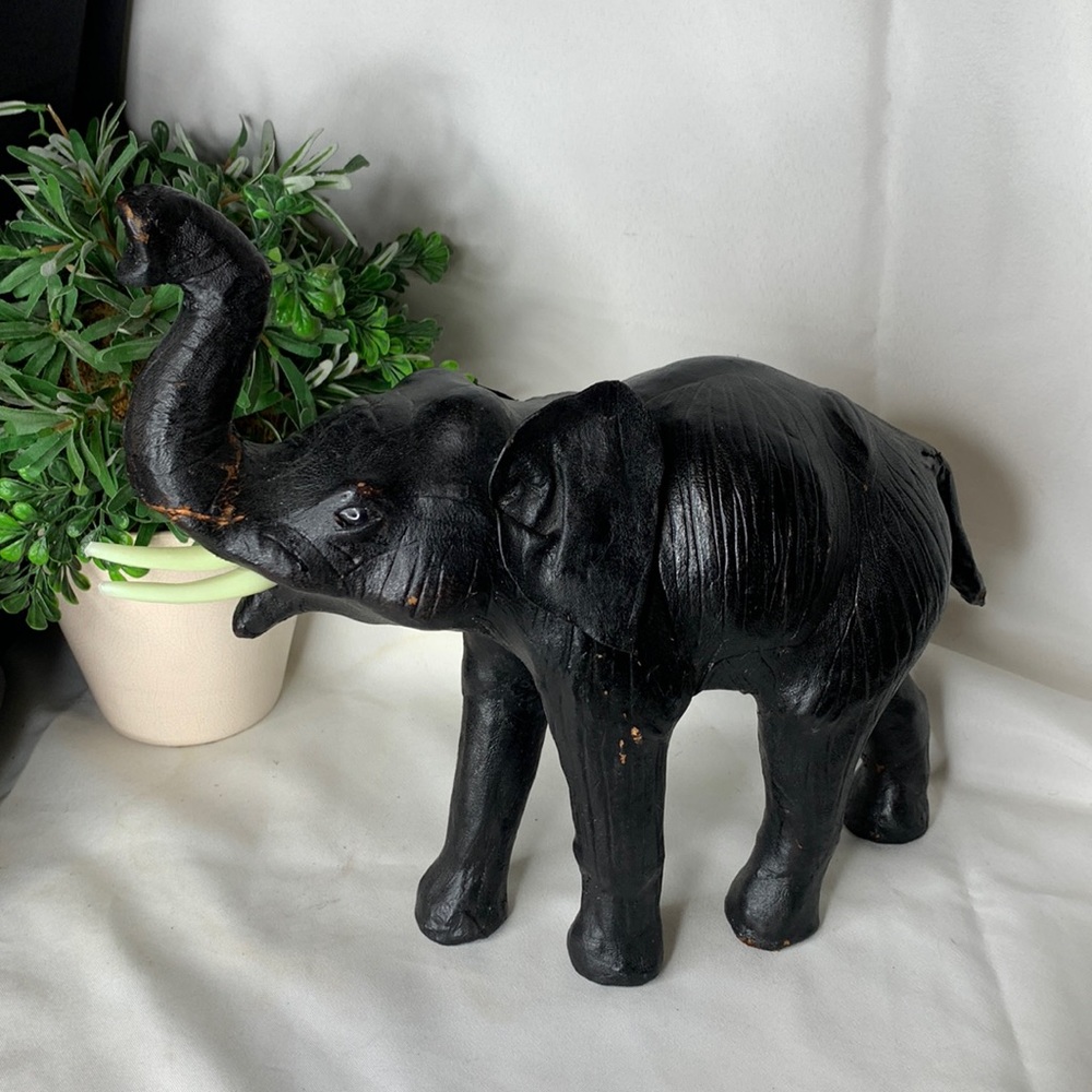 Large vintage black leather elephant figure.